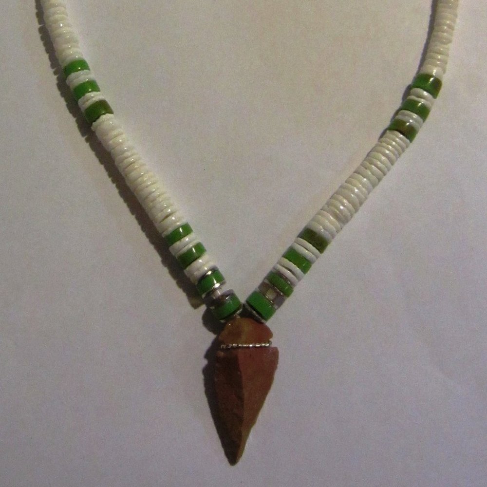 Puka Shell Necklace / accented with jade beads / faux arrow head . very nice.